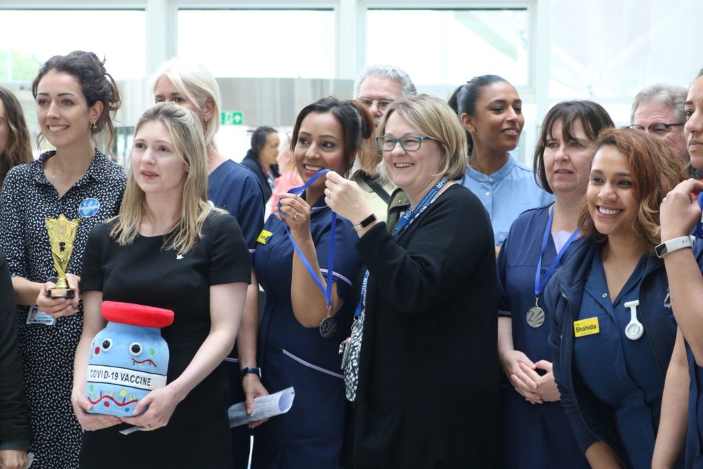 Victoria Day, head of the NIHR Birmingham BRC, holding the joint 2nd place medal together with Farfia Capper, Clinical Deputy Manager of the NIHR Clinical Research Facility