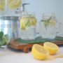 Jars containing detox lemon and water drinks