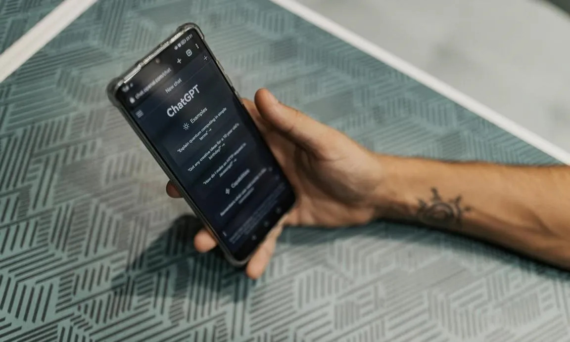 Man using an AI chatbot on his phone